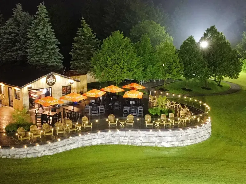 The Worm Burner Pro Shop lit up during night golf.